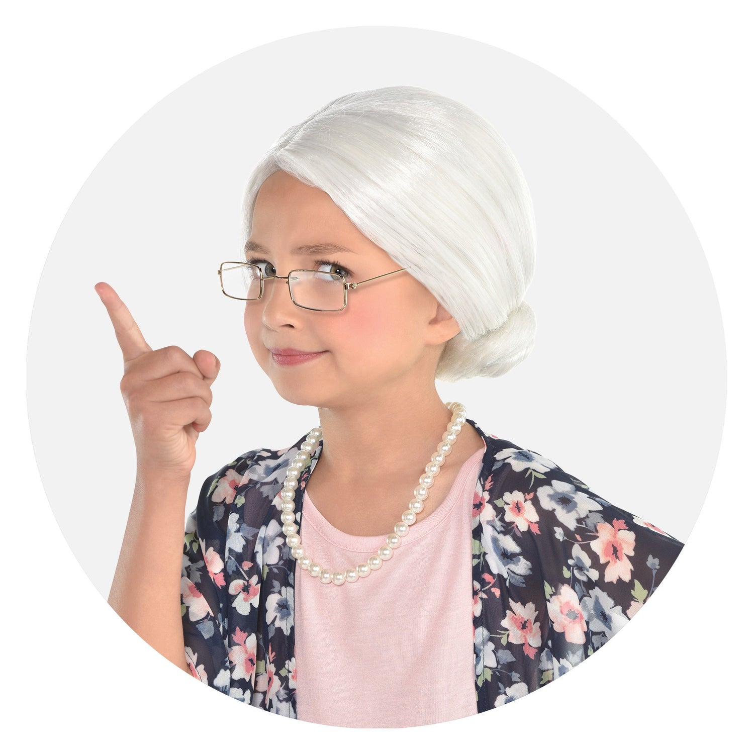  Gemini said A young girl dressed as an elderly woman wearing a white wig, glasses, and a pearl necklace while pointing her finger upward.
