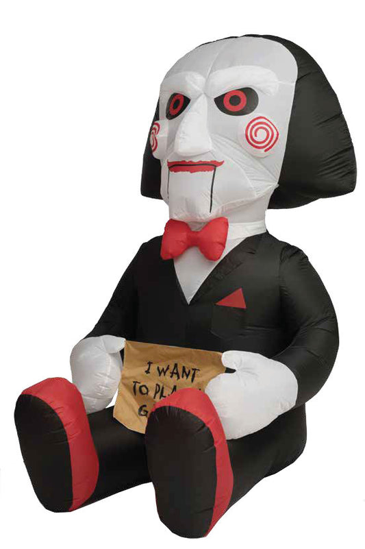 Inflatable character in a suit with a bow tie holding a sign on a white background