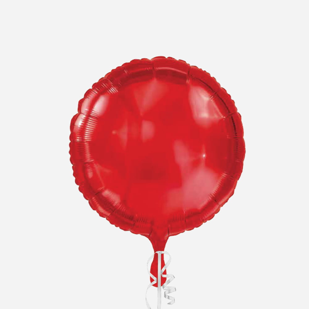 A shiny, round red foil balloon with a silver curling ribbon attached to the bottom.
